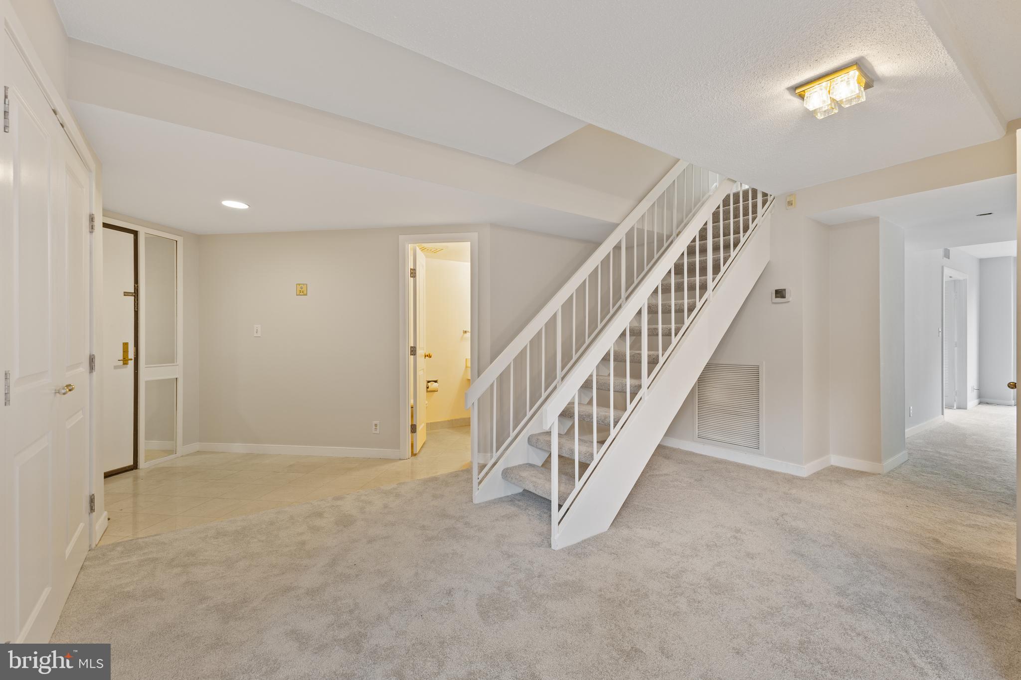 1099 22nd Street Northwest, Unit 601 Washington, DC 20037 - Photo 5 of 41 a view of an entryway with stairs