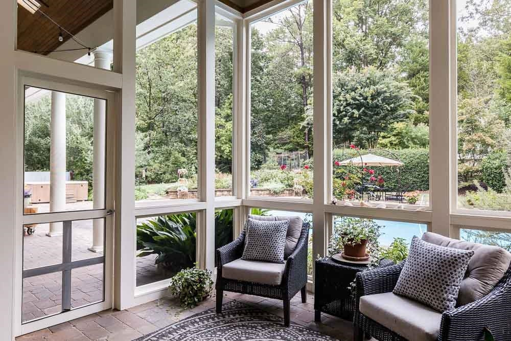5204 Atherton Bridge Road Raleigh, NC 27613 - Photo 13 of 30 Enjoy mornings in the sunshine and cooler evenings in the shade with the fan blowing! Screened Porch