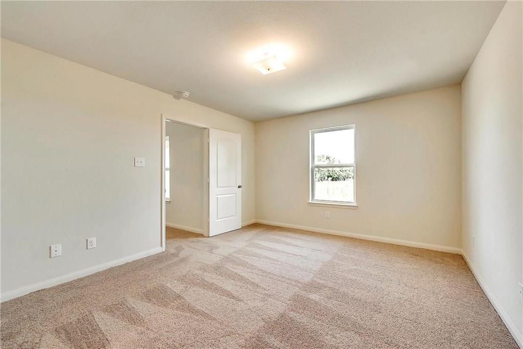 1810 Clegg Street Howe, TX 75459 - Photo 13 of 14 a view of an empty room with a window