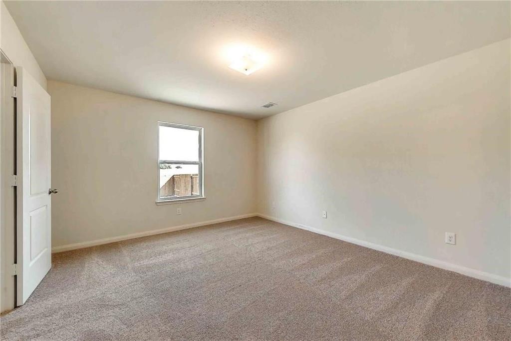 1810 Clegg Street Howe, TX 75459 - Photo 14 of 14 an empty room with a window