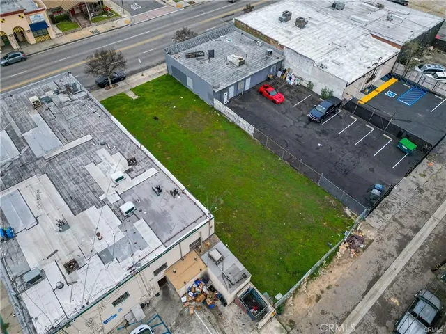 an aerial view of a house with a garden