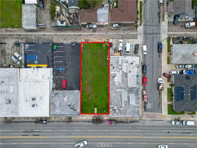 a view of a street with cars