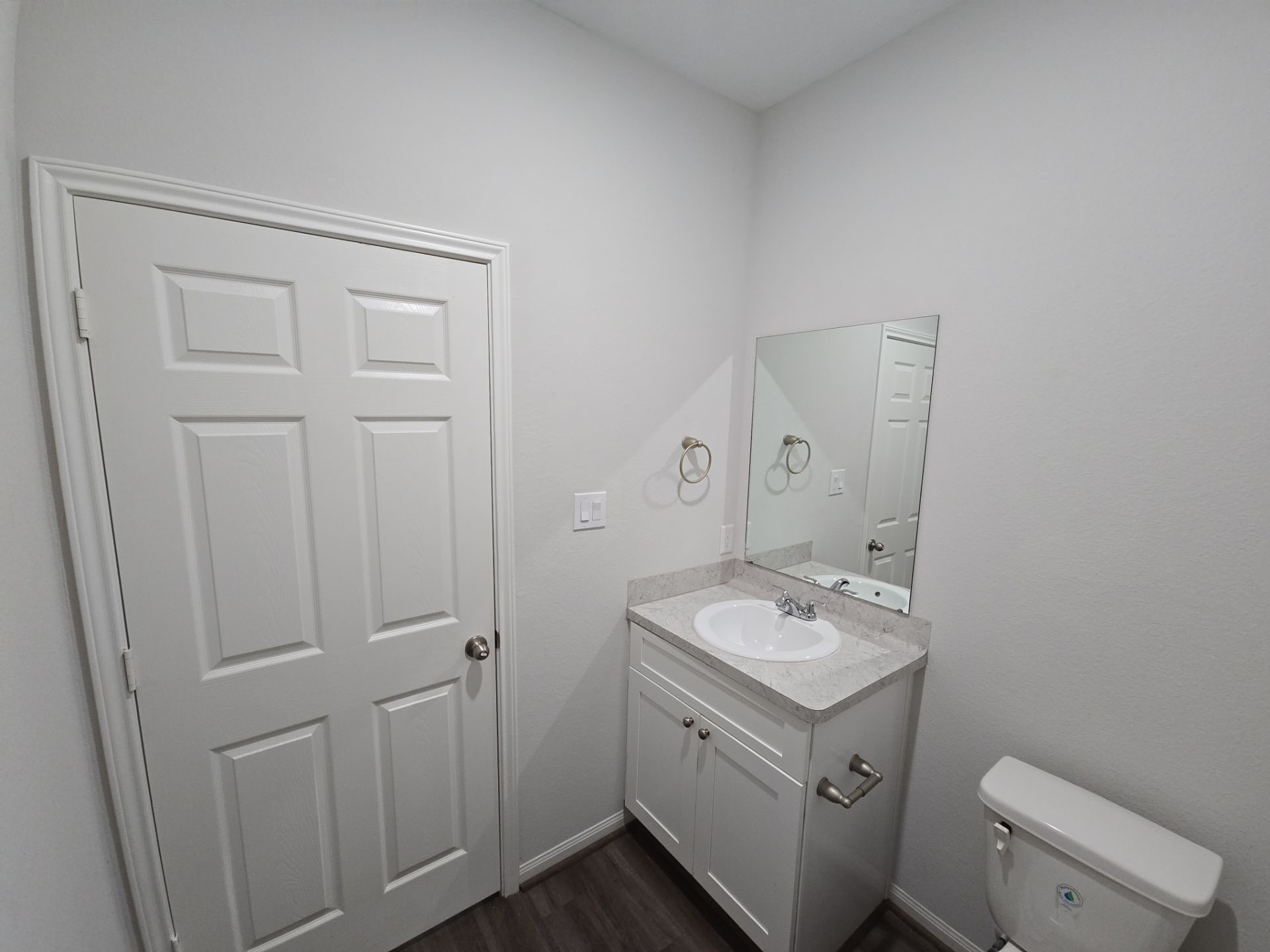 9509 Madera Road, Unit A Houston, TX 77078 - Photo 19 of 29 a bathroom with a sink a toilet and vanity