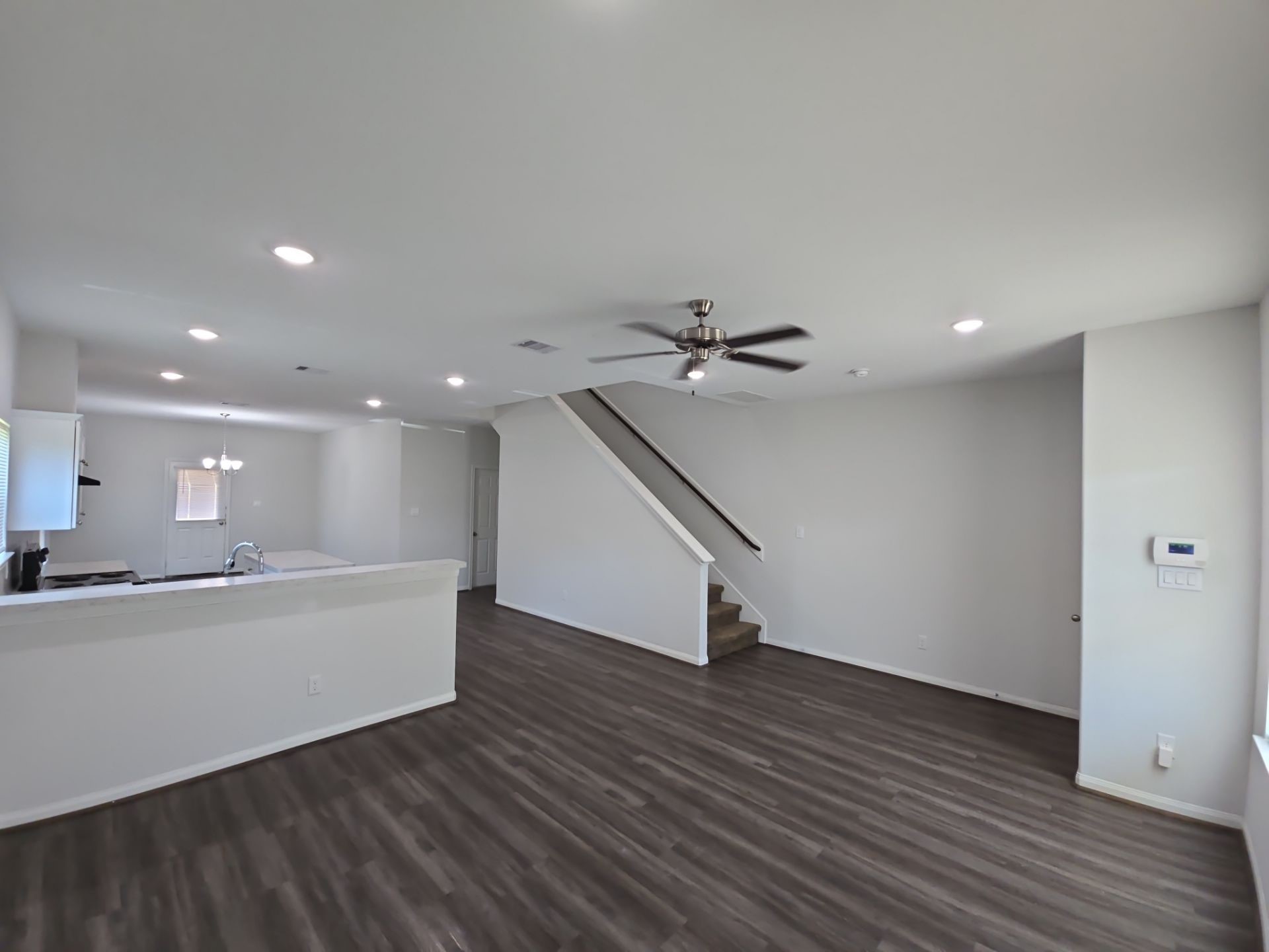 9509 Madera Road, Unit A Houston, TX 77078 - Photo 2 of 29 a view of a room with wooden floor and staircase