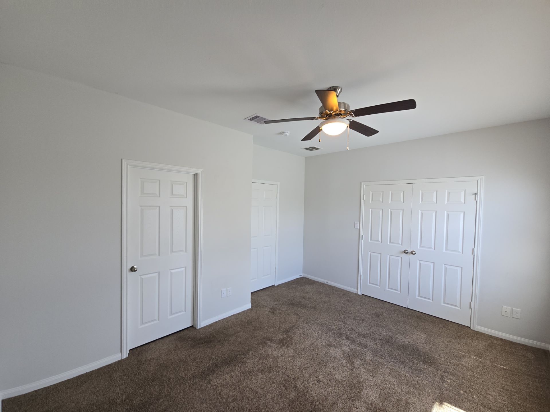 9509 Madera Road, Unit A Houston, TX 77078 - Photo 9 of 29 a living room with ceiling fan
