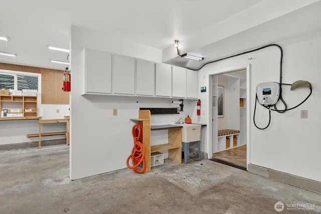 a backyard of a house with garage