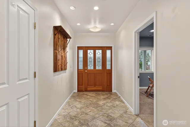 a workspace with furniture and window