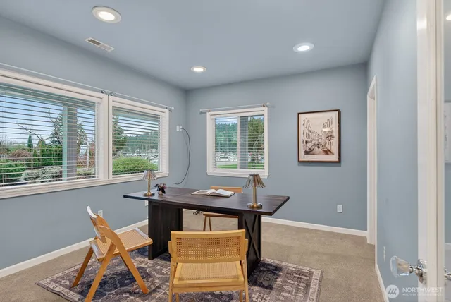 a view of cabinets and wooden floor