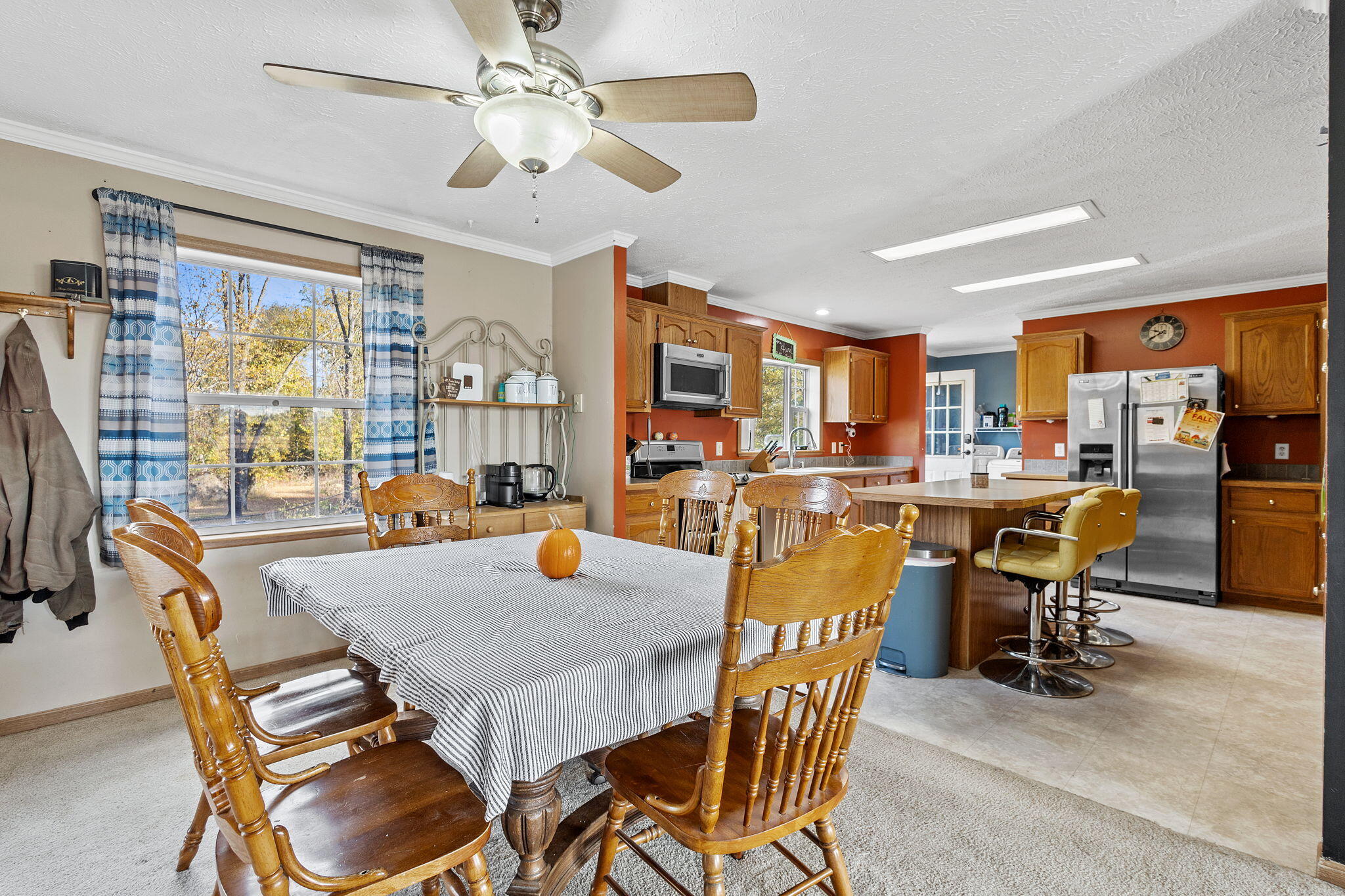 6303 Highway 231 Rensselaer, IN 47978 - Photo 13 of 41 a view of a dining room with furniture window and outside view