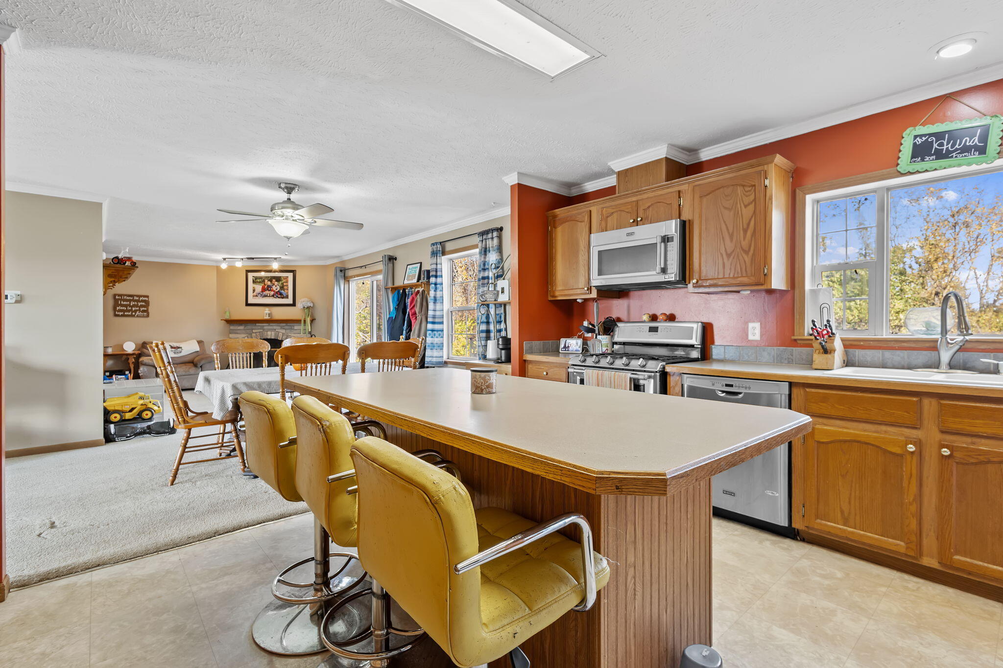 6303 Highway 231 Rensselaer, IN 47978 - Photo 18 of 41 a kitchen with stainless steel appliances granite countertop a sink and cabinets
