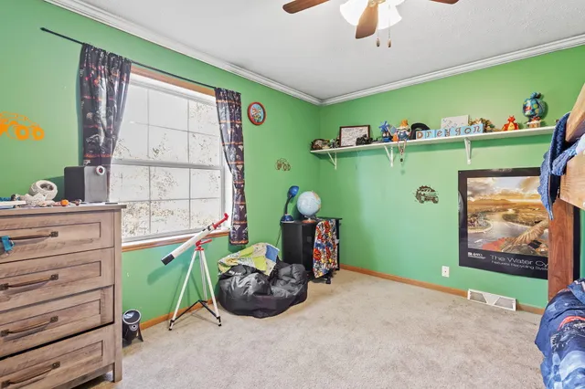 a room with toys and a large window