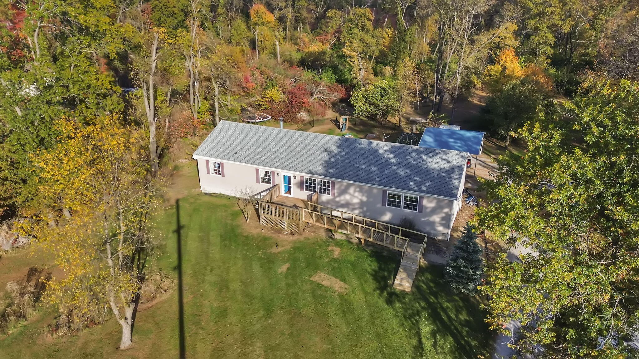 6303 Highway 231 Rensselaer, IN 47978 - Photo 4 of 41 an aerial view of residential houses with outdoor space and trees