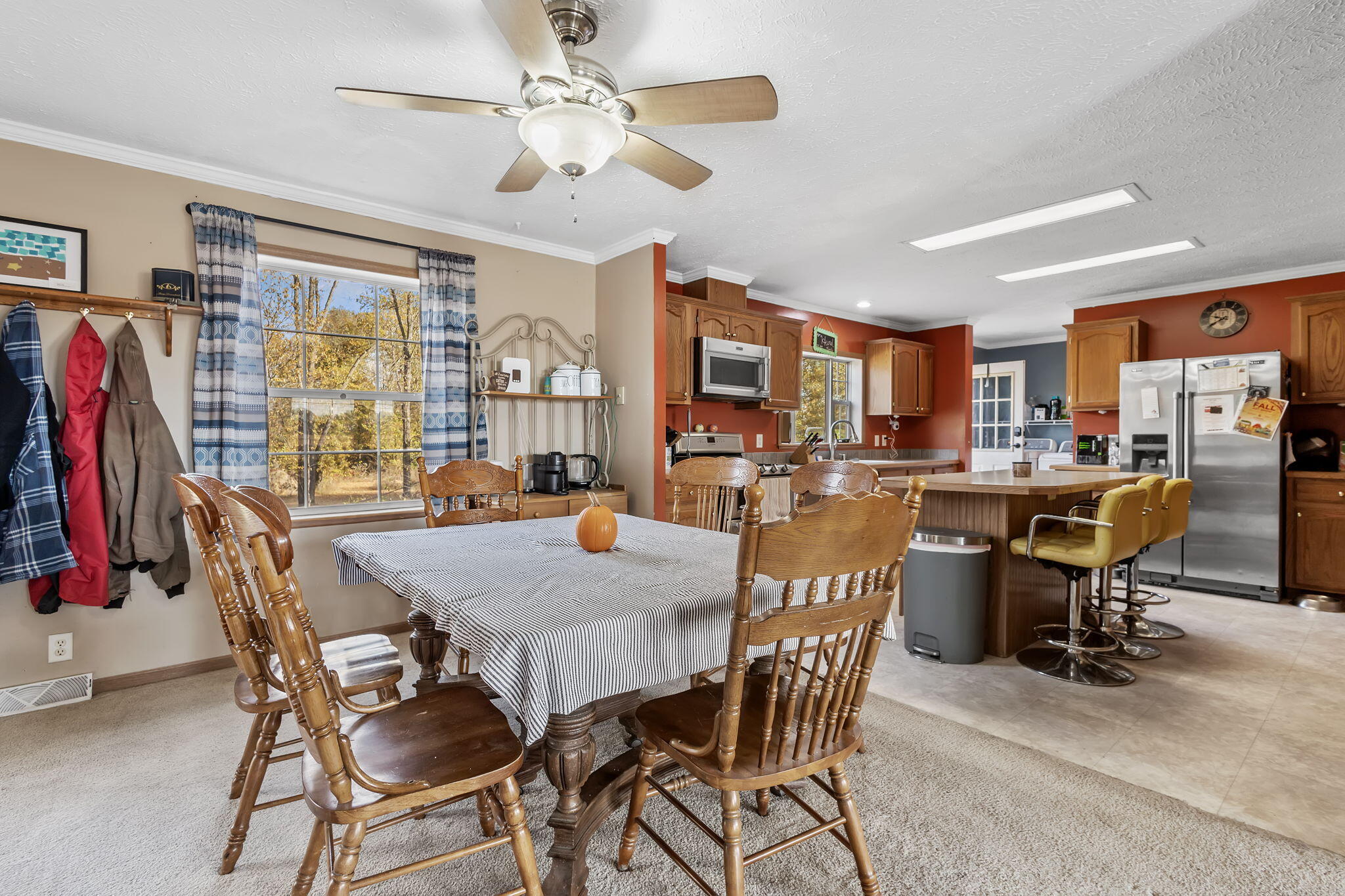 6303 Highway 231 Rensselaer, IN 47978 - Photo 9 of 41 a view of a dining room with furniture and a chandelier