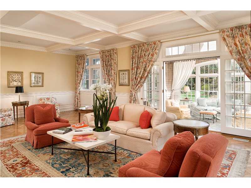1021 Ponus Ridge Road New Canaan, CT 06840 - Photo 4 of 25 a living room with furniture a rug and a large window