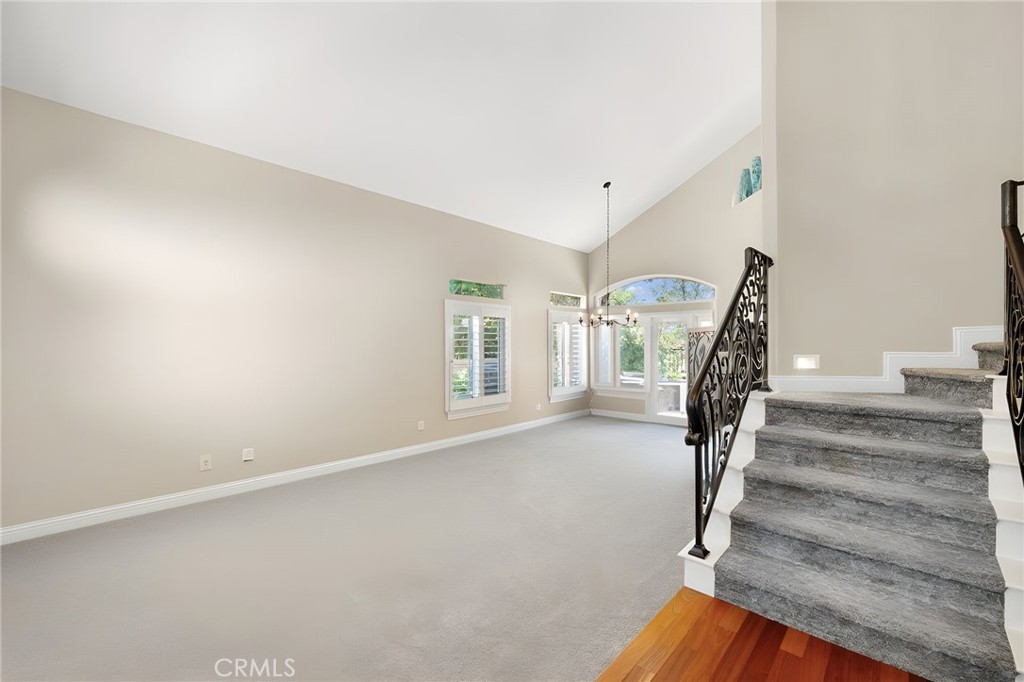 28561 Camelback Road Trabuco Canyon, CA 92679 - Photo 35 of 66 a view of entryway with wooden floor and stairs