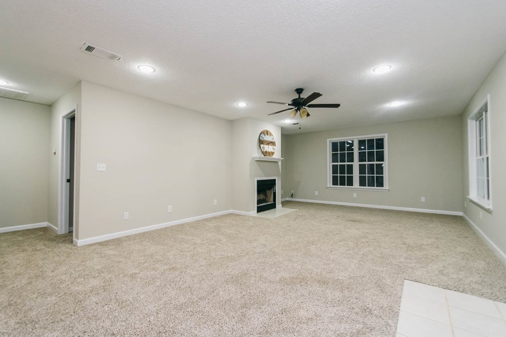 4841 Sandy Point Road Lizella, GA 31052 - Photo 20 of 42 a view of an empty room with a window