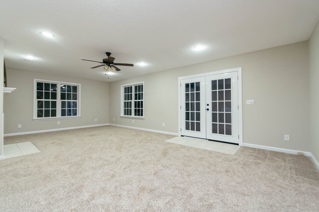 4841 Sandy Point Road Lizella, GA 31052 - Photo 21 of 42 a view of an empty room with a window