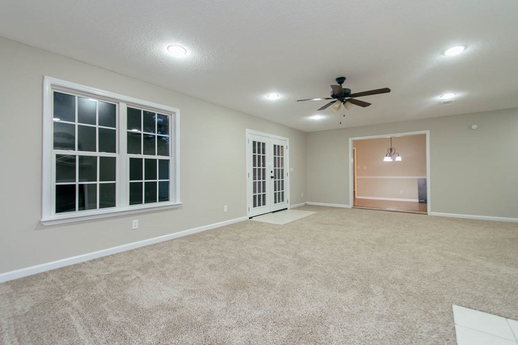 4841 Sandy Point Road Lizella, GA 31052 - Photo 22 of 42 a view of an empty room with a window