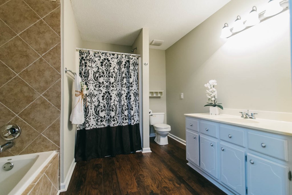 4841 Sandy Point Road Lizella, GA 31052 - Photo 26 of 42 a bathroom with a sink a toilet and shower