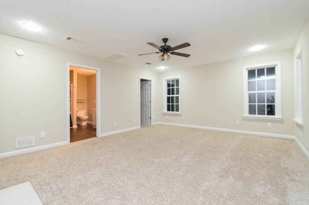4841 Sandy Point Road Lizella, GA 31052 - Photo 29 of 42 a view of an empty room with a window