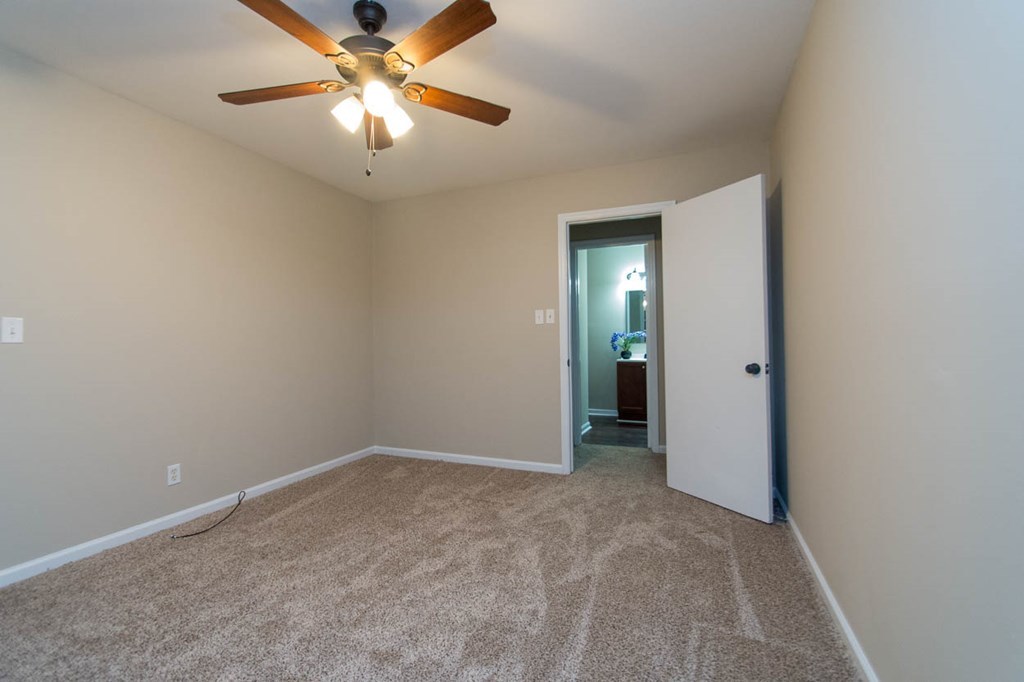 4841 Sandy Point Road Lizella, GA 31052 - Photo 31 of 42 a view of an empty room and chandelier fan