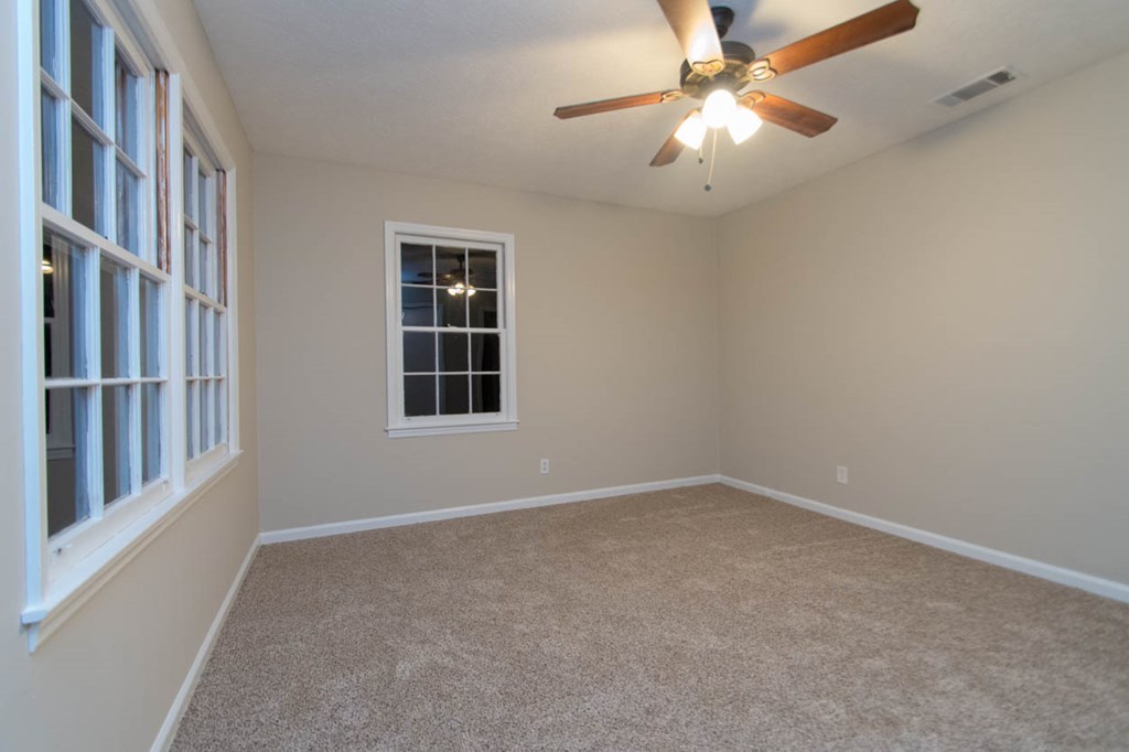 4841 Sandy Point Road Lizella, GA 31052 - Photo 34 of 42 a view of an empty room with a window