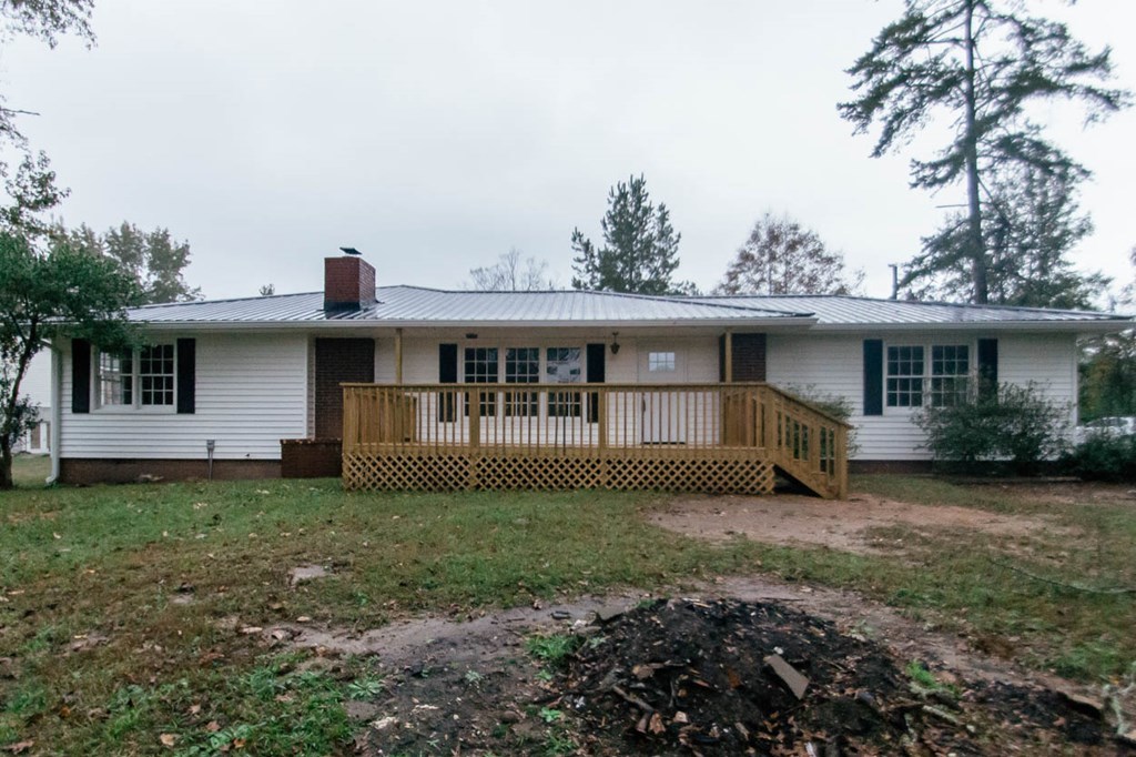 4841 Sandy Point Road Lizella, GA 31052 - Photo 38 of 42 a view of a house with a yard