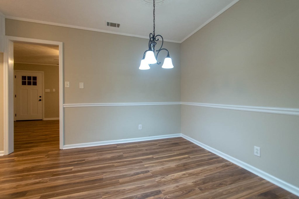 4841 Sandy Point Road Lizella, GA 31052 - Photo 10 of 42 a view of a livingroom with wooden floor