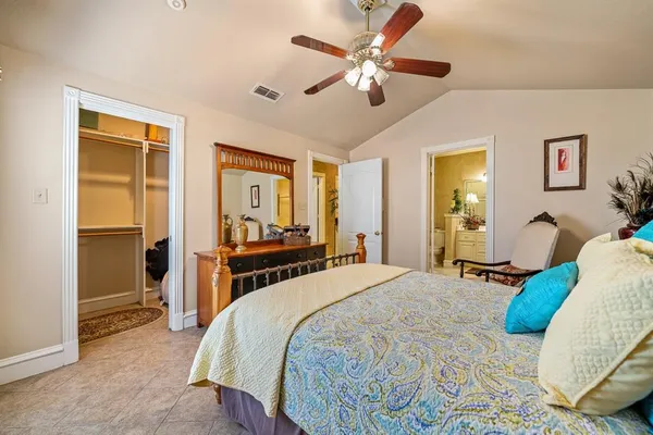 an aerial view of a house with a yard swimming pool and mountain view