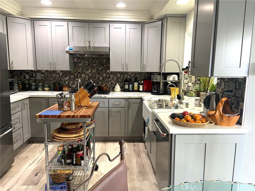 14 Rainbow Irvine, CA 92614 - Photo 4 of 20 Remodeled Gourmet kitchen with large windows overlooking the patio