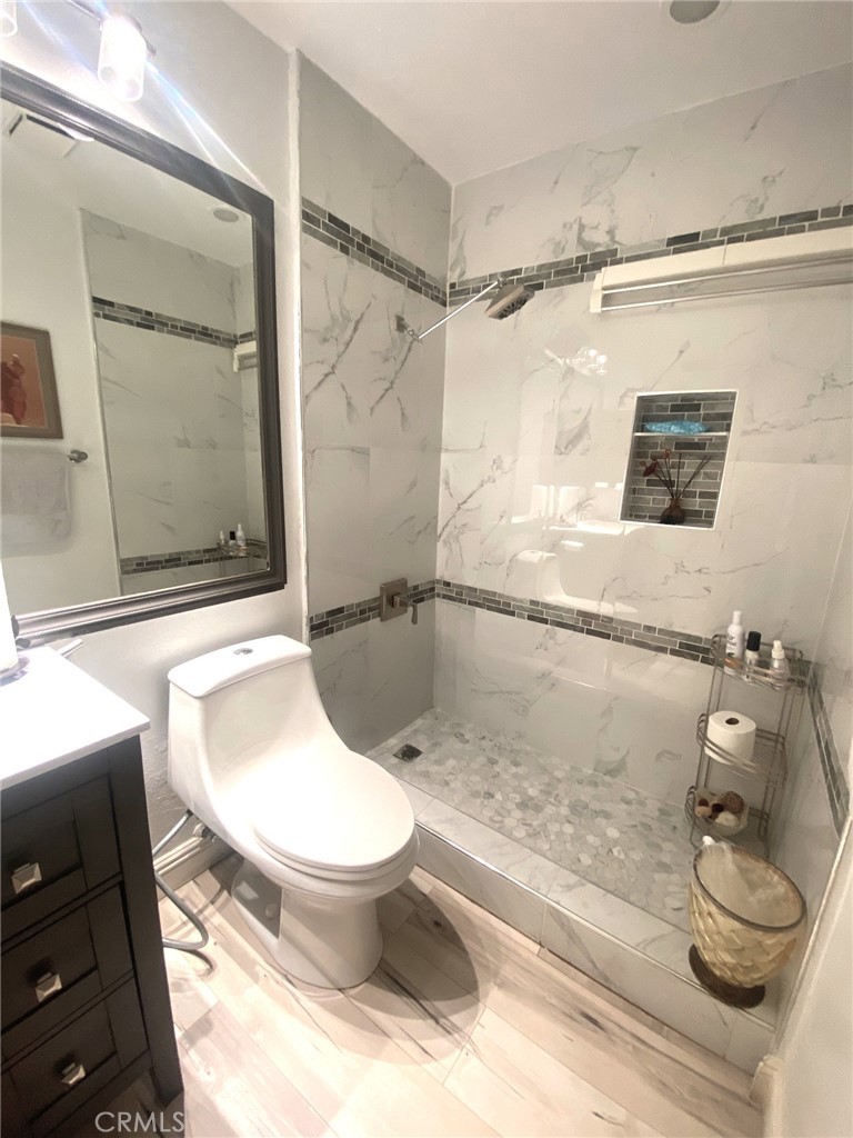 14 Rainbow Irvine, CA 92614 - Photo 10 of 20 All bathrooms remodeled -
Downstairs Full Bathroom with Walk-in Shower