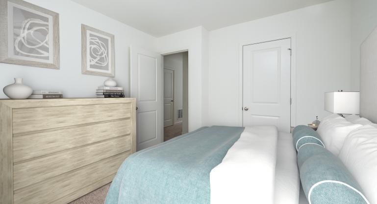1520 Vernon Boulevard, Unit 101 Decatur, GA 30035 - Photo 1 of 1 a bedroom with a bed and lamp