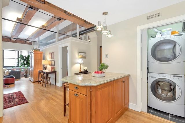 a view of a living room and dining room