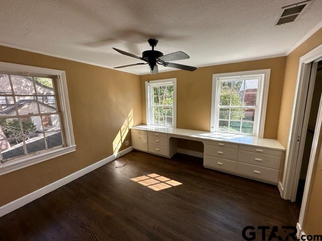 2002 South Robertson Avenue Tyler, TX 75701 - Photo 11 of 16 a view of workspace with wooden floor and windows