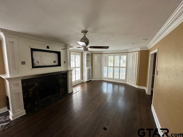 2002 South Robertson Avenue Tyler, TX 75701 - Photo 4 of 16 a view of an empty room with window and wooden floor