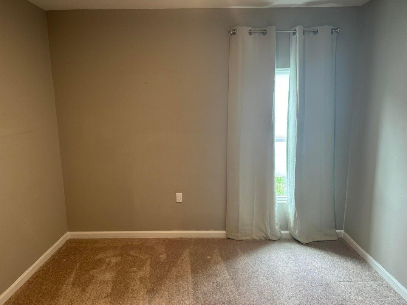 345 Clementine Road Fort Pierce, FL 34981 - Photo 10 of 13 a view of an empty room with closet area