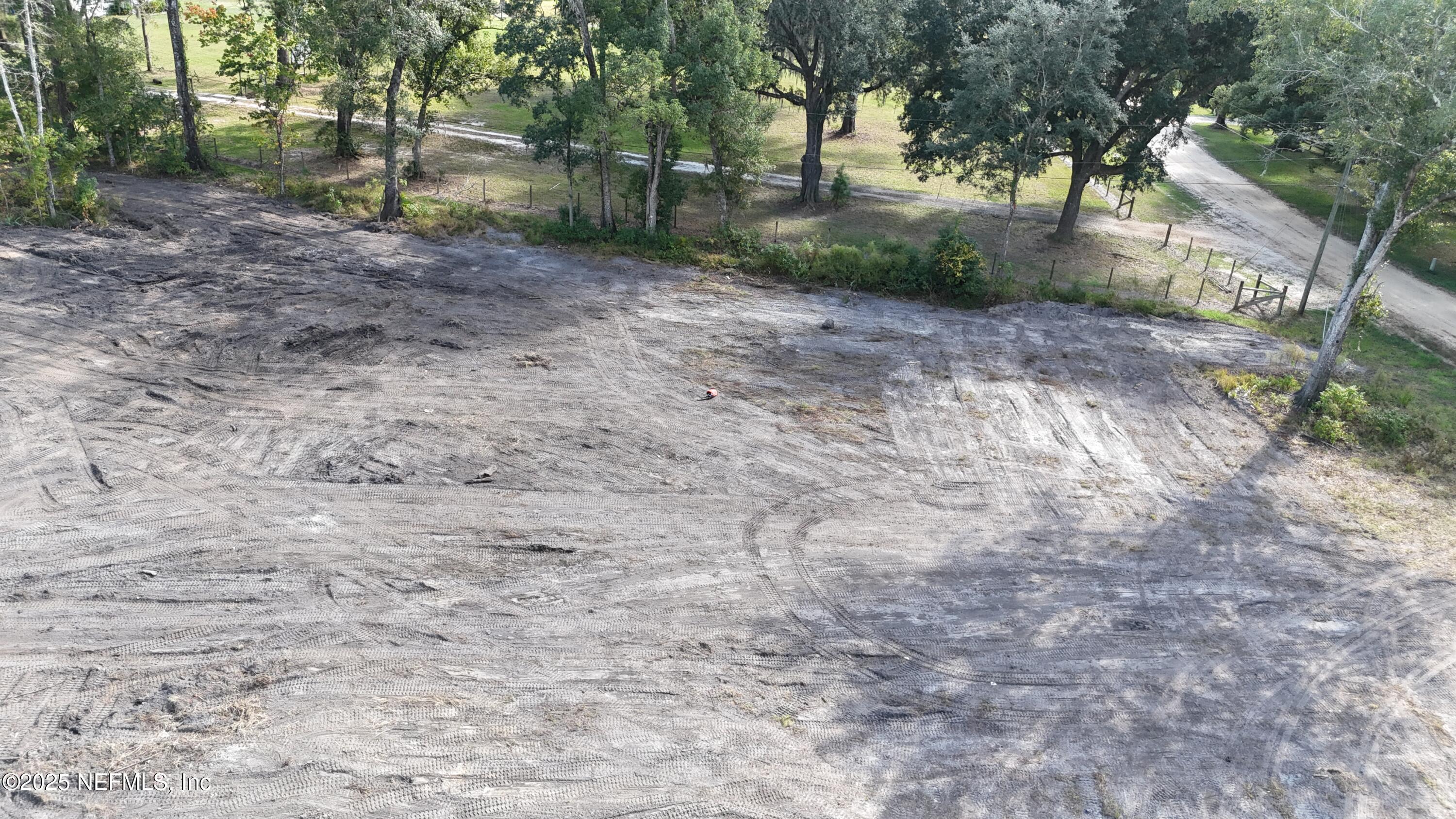 0 Wilbur Jones Road Callahan, FL 32011 - Photo 2 of 31 a view of a backyard with large trees