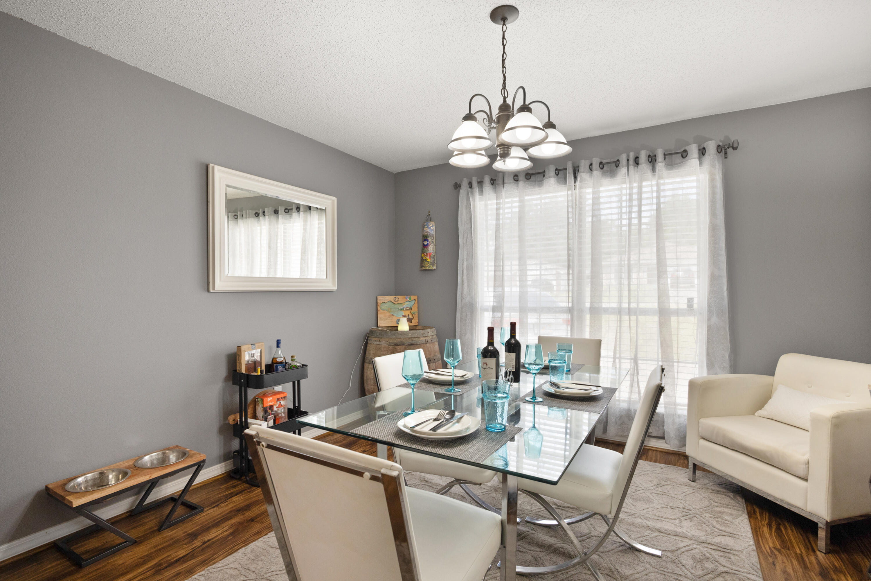 143 Sandstone Trail Crestview, FL 32539 - Photo 18 of 40 a dining room with furniture a chandelier and window