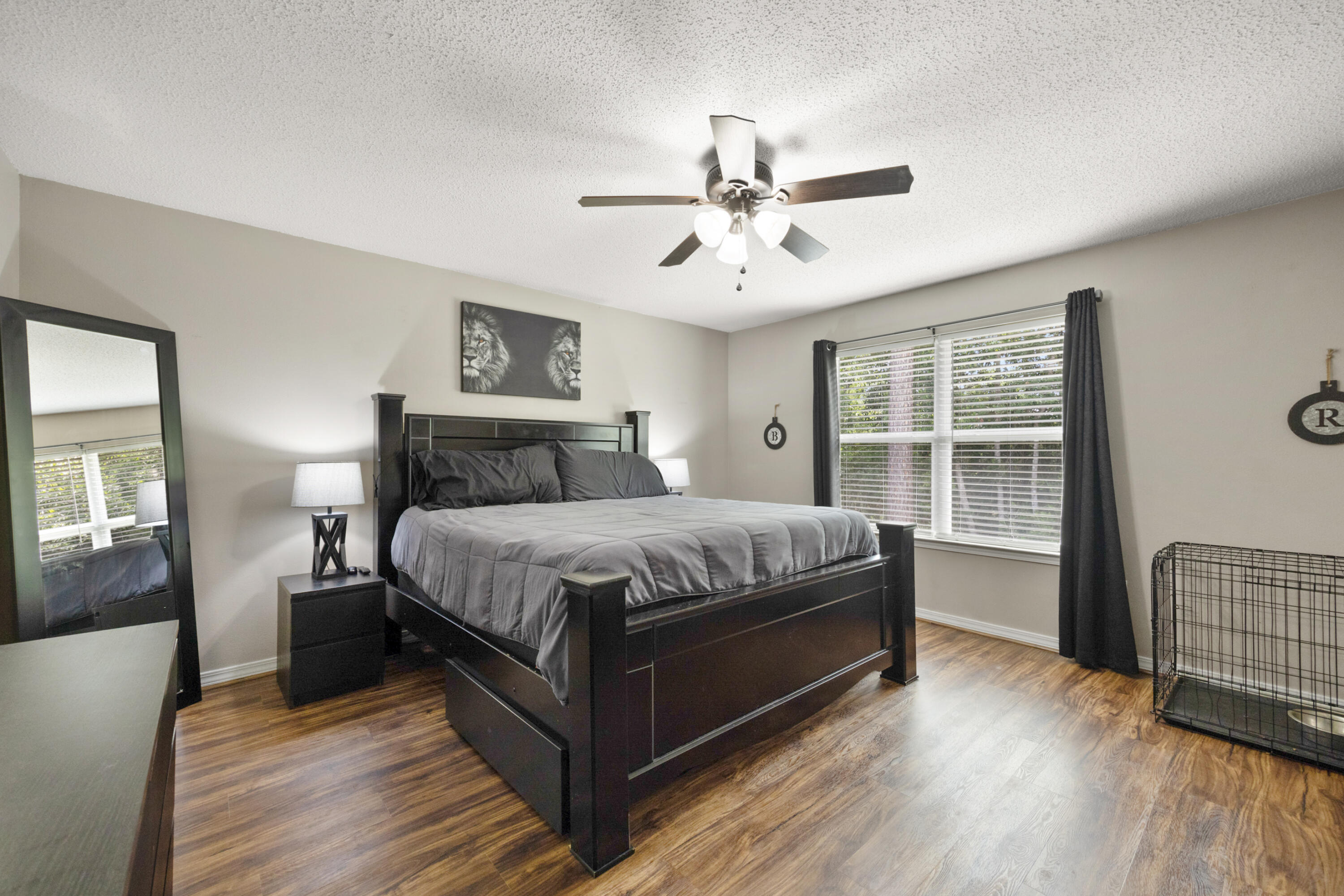 143 Sandstone Trail Crestview, FL 32539 - Photo 19 of 40 a bedroom with a large bed and a window