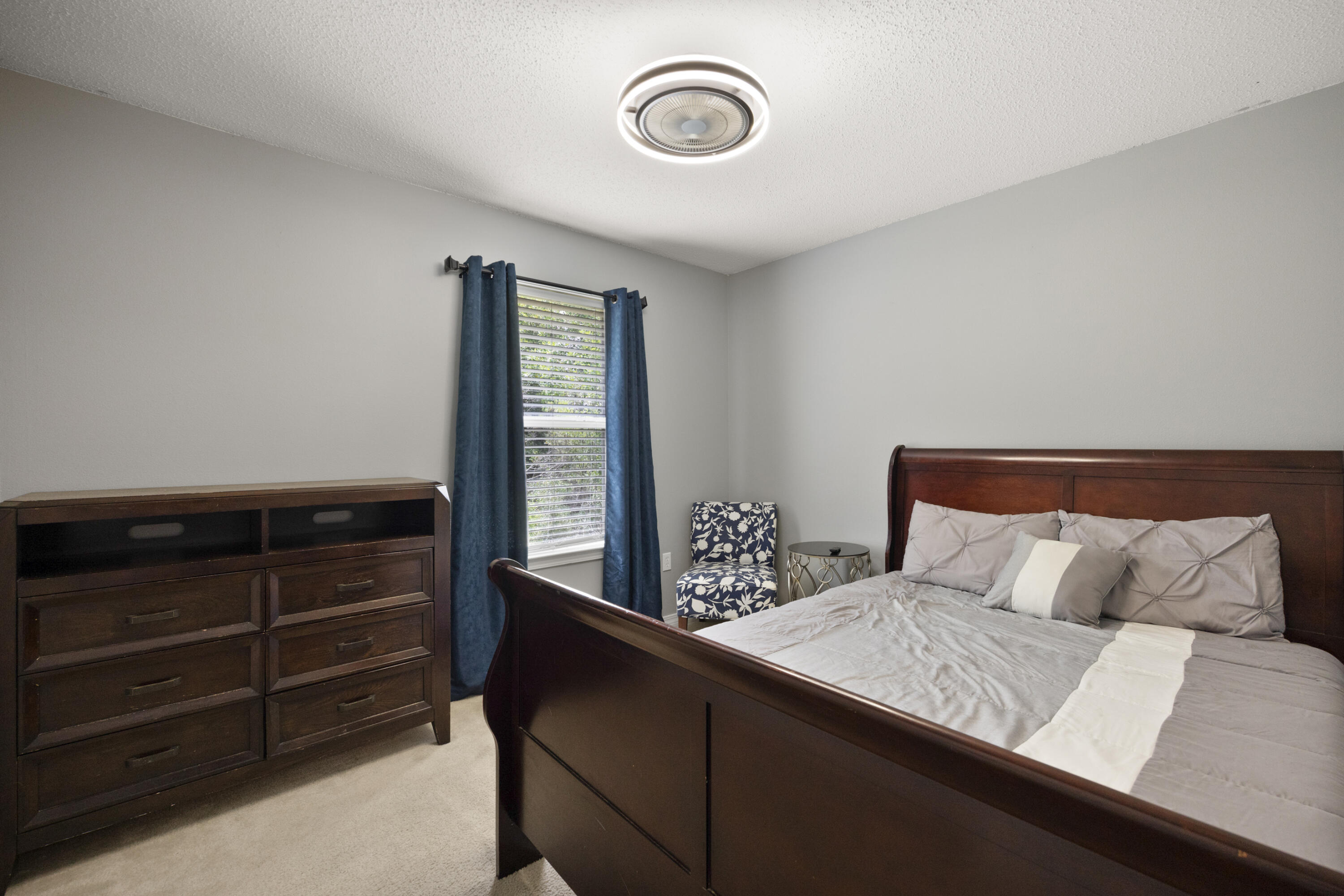 143 Sandstone Trail Crestview, FL 32539 - Photo 25 of 40 a bedroom with a bed and a window