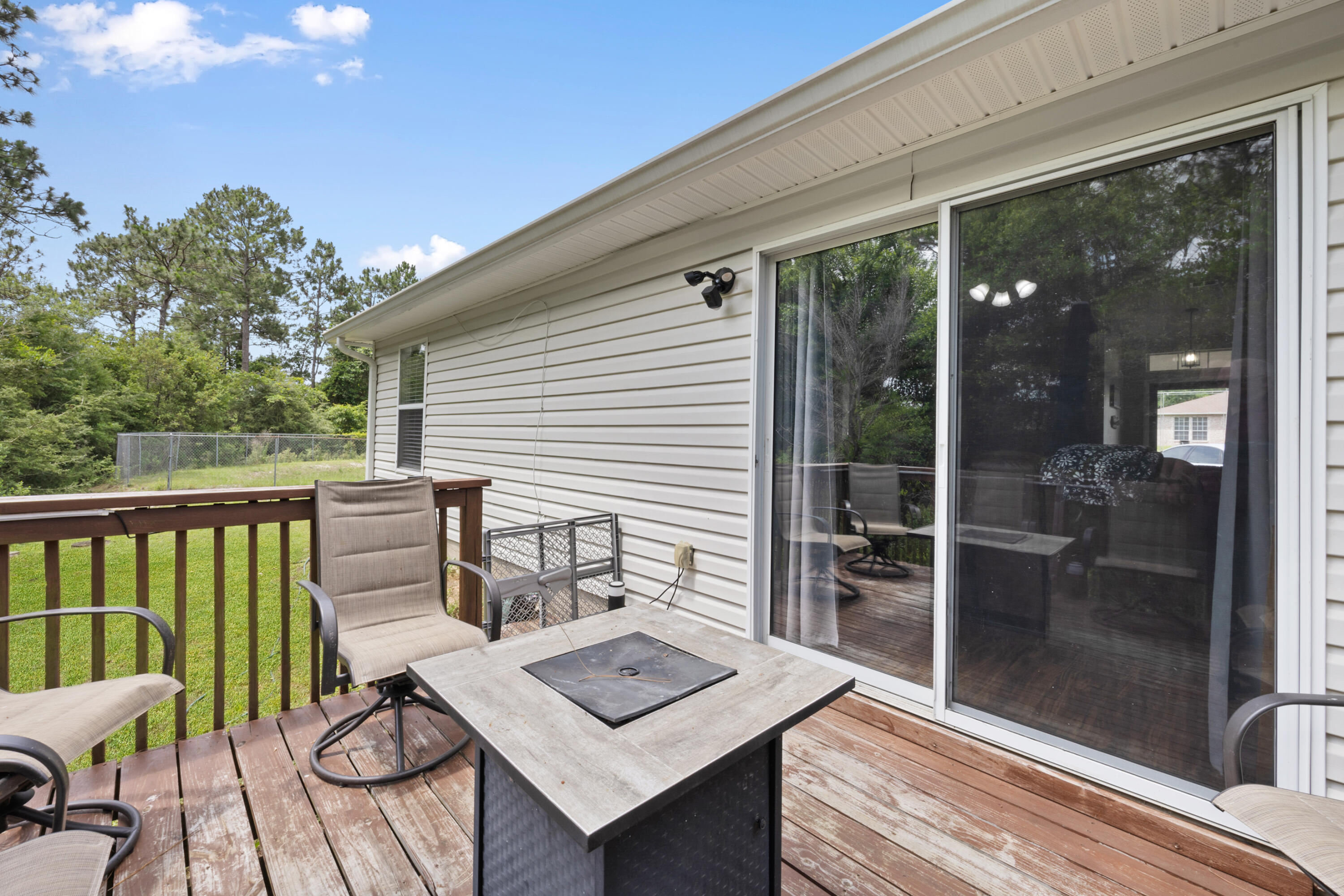 143 Sandstone Trail Crestview, FL 32539 - Photo 34 of 40 a view of a balcony with furniture