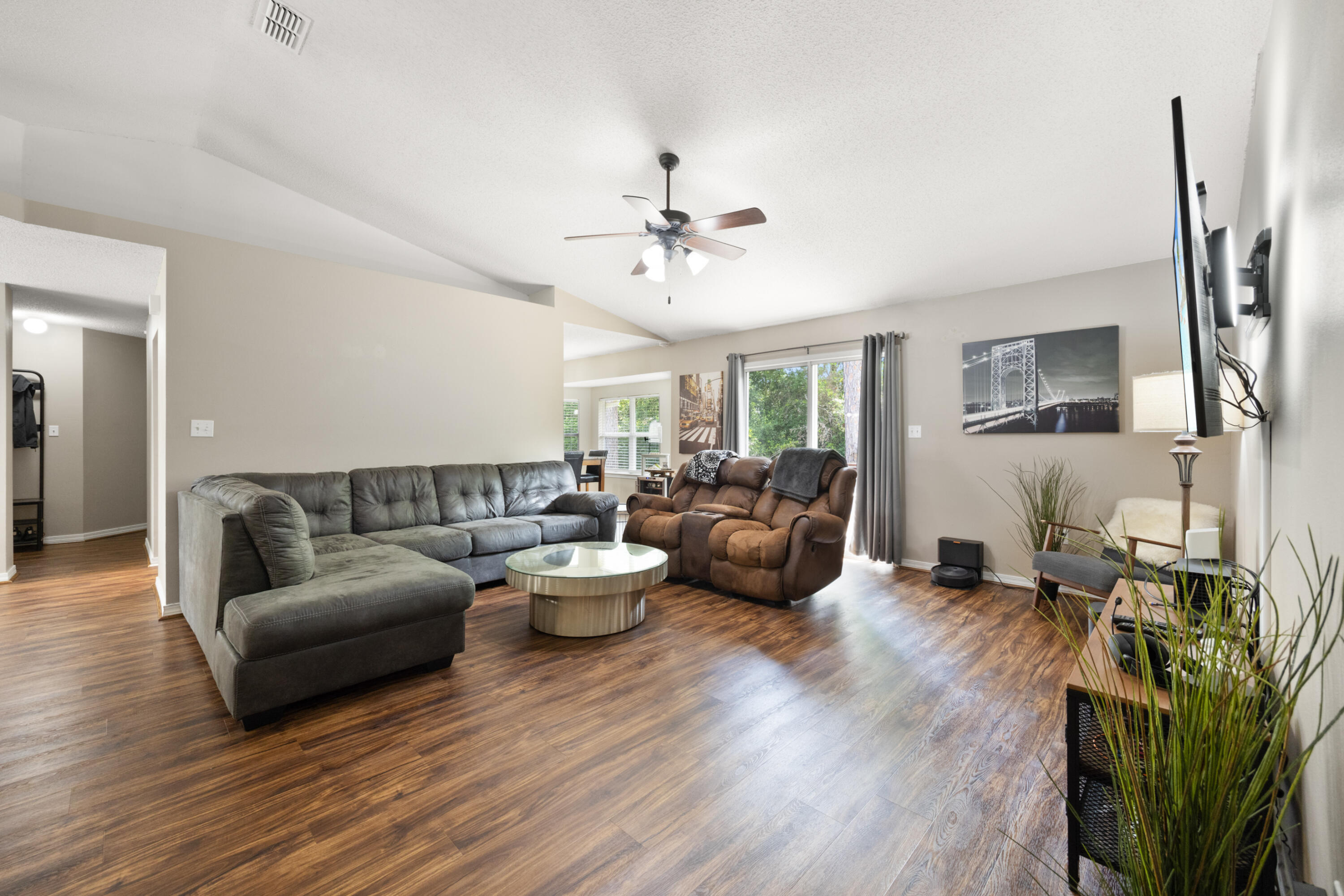 143 Sandstone Trail Crestview, FL 32539 - Photo 5 of 40 a living room with furniture and a wooden floor