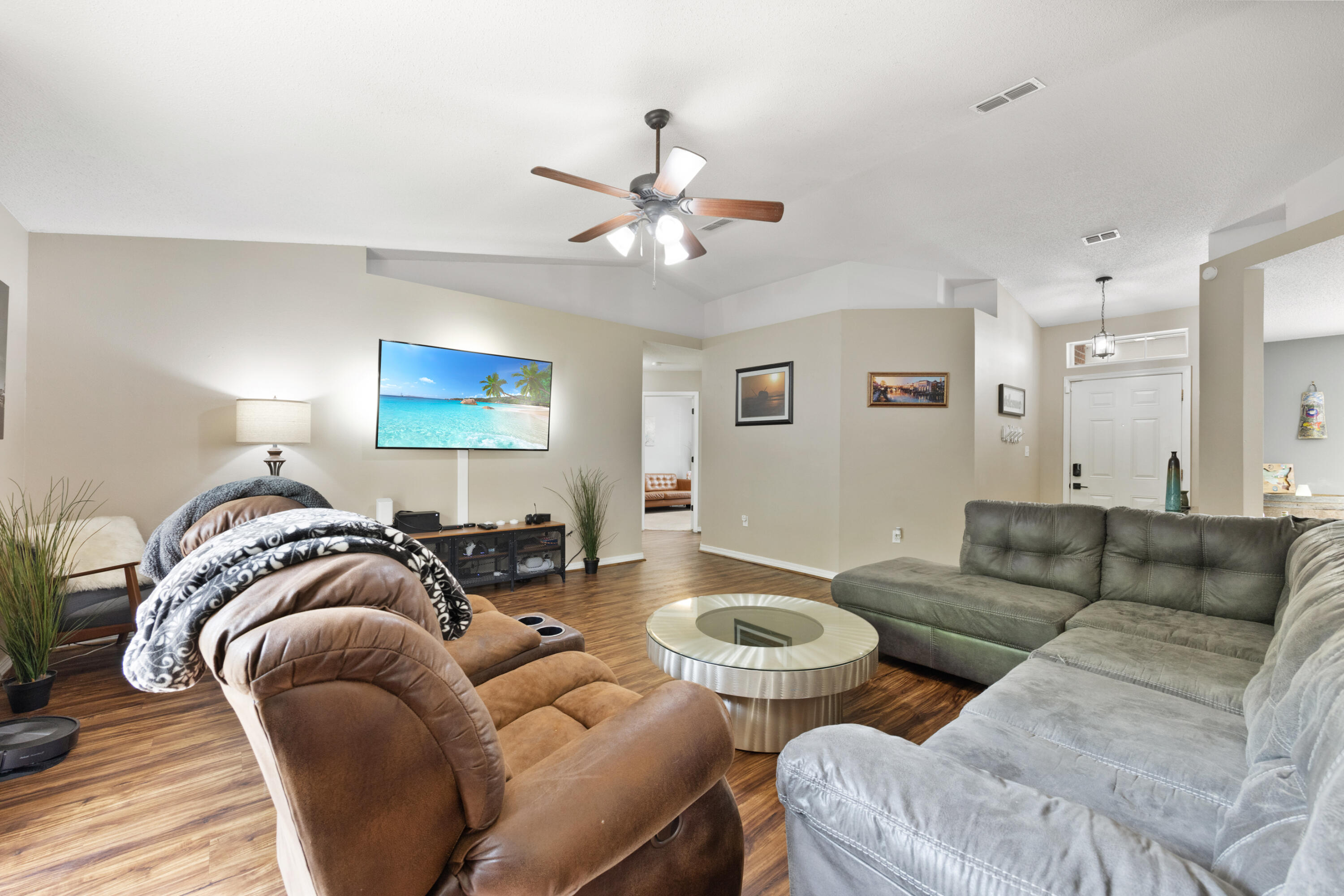 143 Sandstone Trail Crestview, FL 32539 - Photo 6 of 40 a living room with furniture and a couch