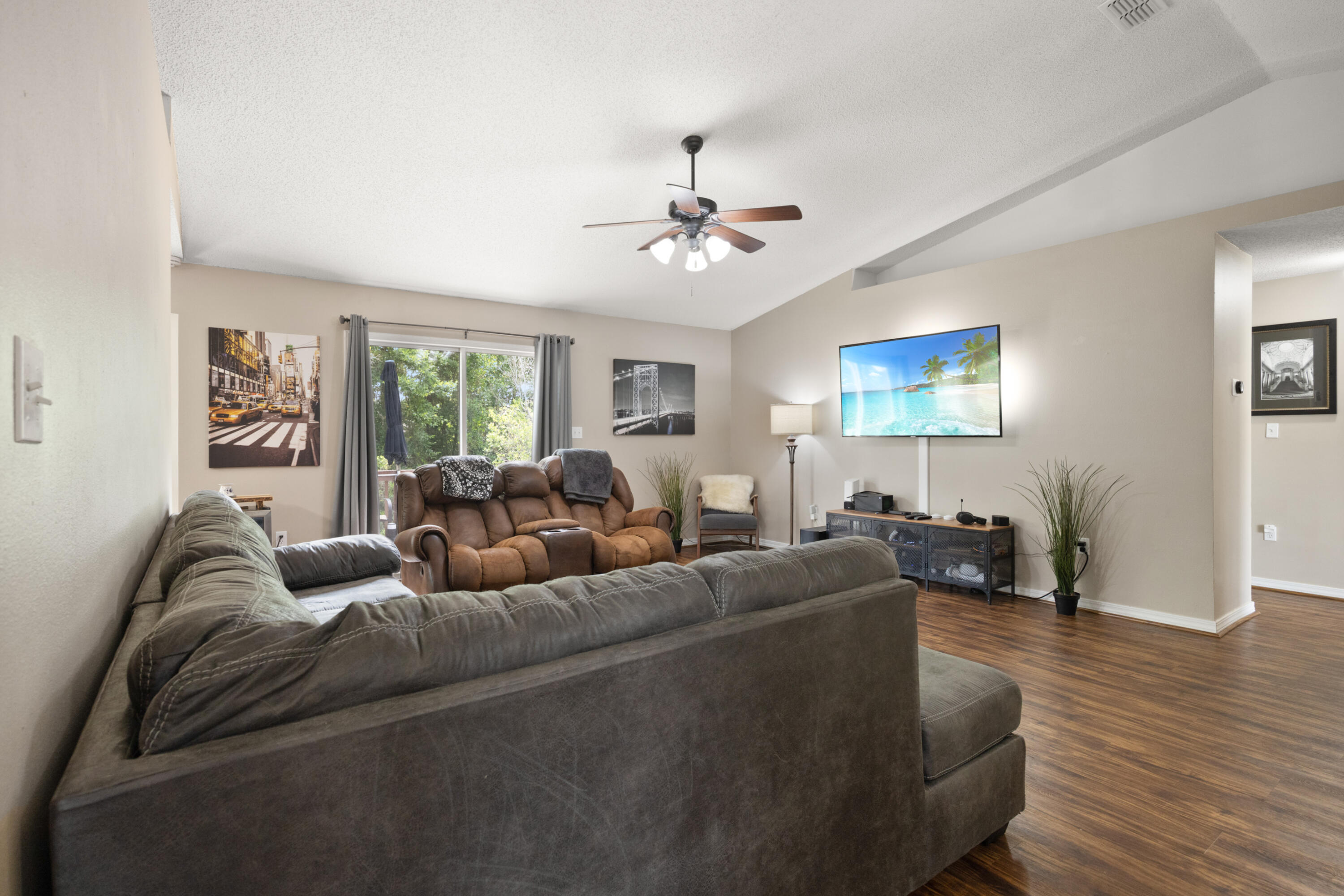 143 Sandstone Trail Crestview, FL 32539 - Photo 7 of 40 a living room with furniture ceiling fan and a window