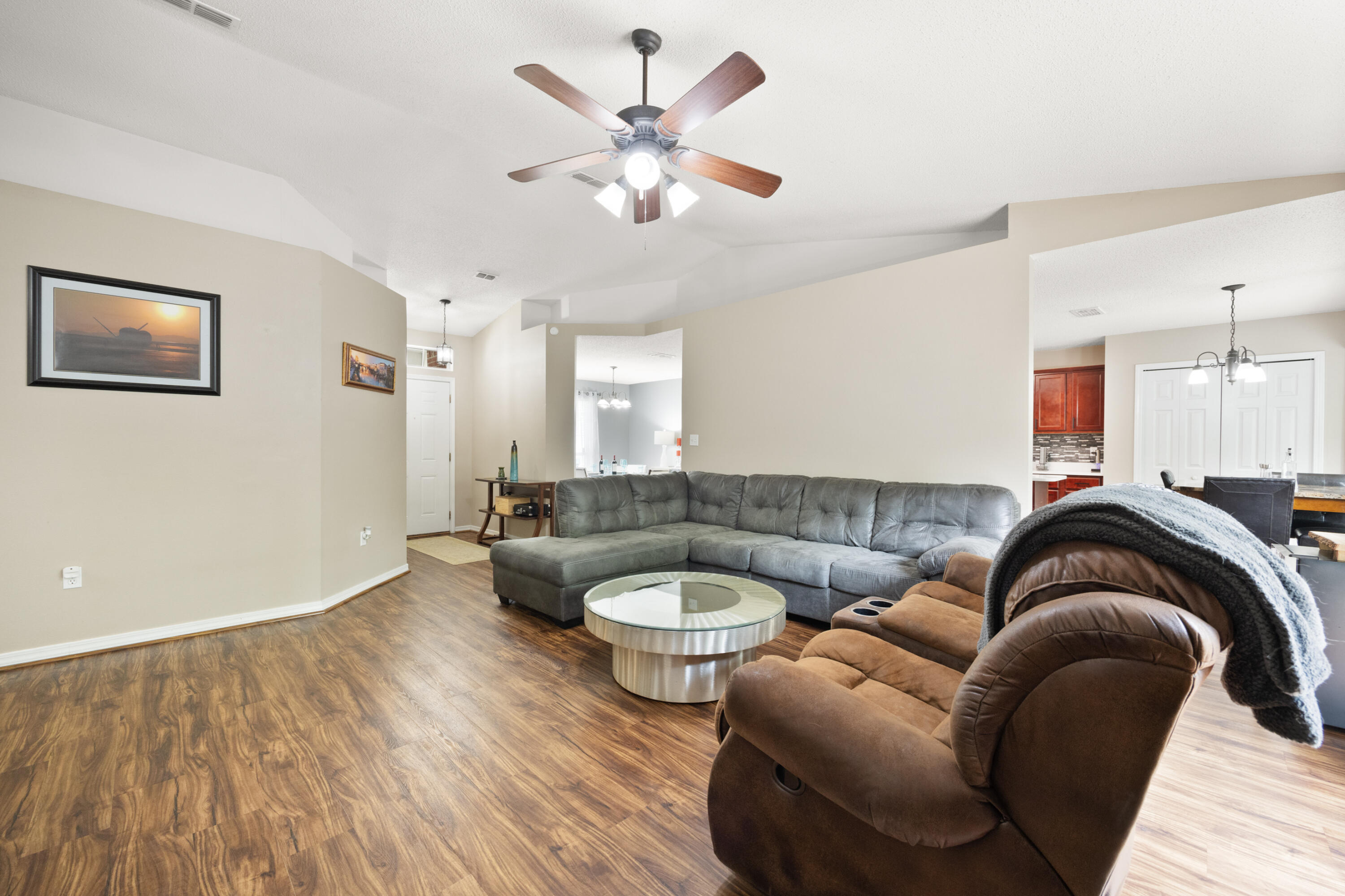 143 Sandstone Trail Crestview, FL 32539 - Photo 8 of 40 a living room with furniture and a large window