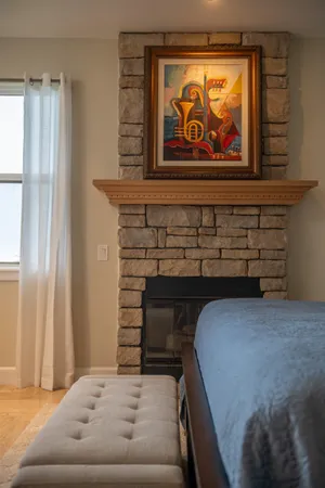 a bedroom with a bed and furniture