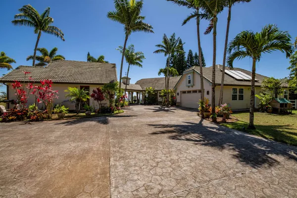 a view of a street with a building and a table in the house
