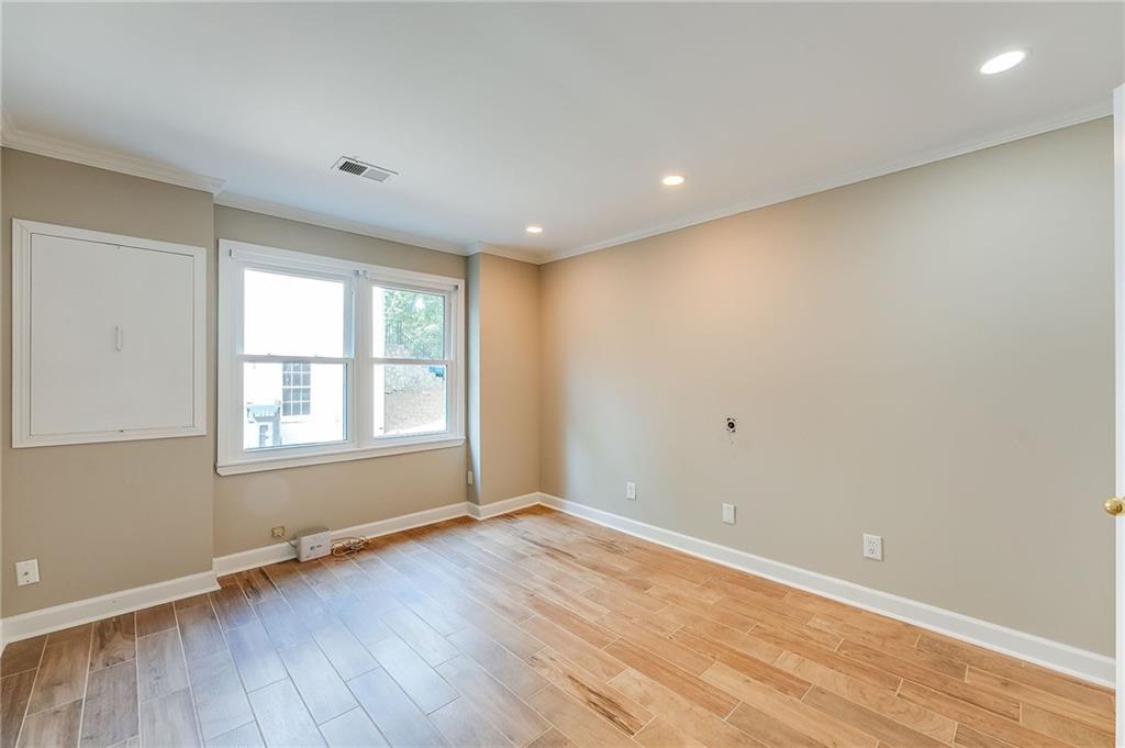 5719 Brookstone Walk Northwest Acworth, GA 30101 - Photo 28 of 54 an empty room with wooden floor and windows