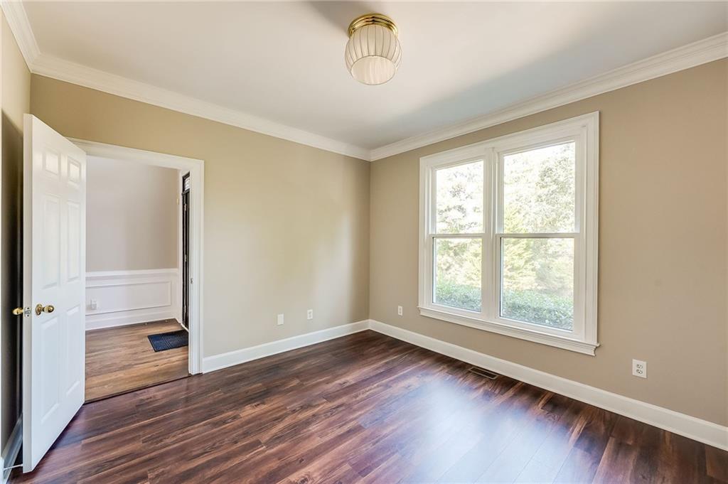 5719 Brookstone Walk Northwest Acworth, GA 30101 - Photo 38 of 54 an empty room with wooden floor and windows