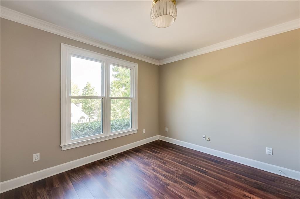 5719 Brookstone Walk Northwest Acworth, GA 30101 - Photo 43 of 54 wooden floor in an empty room with a window